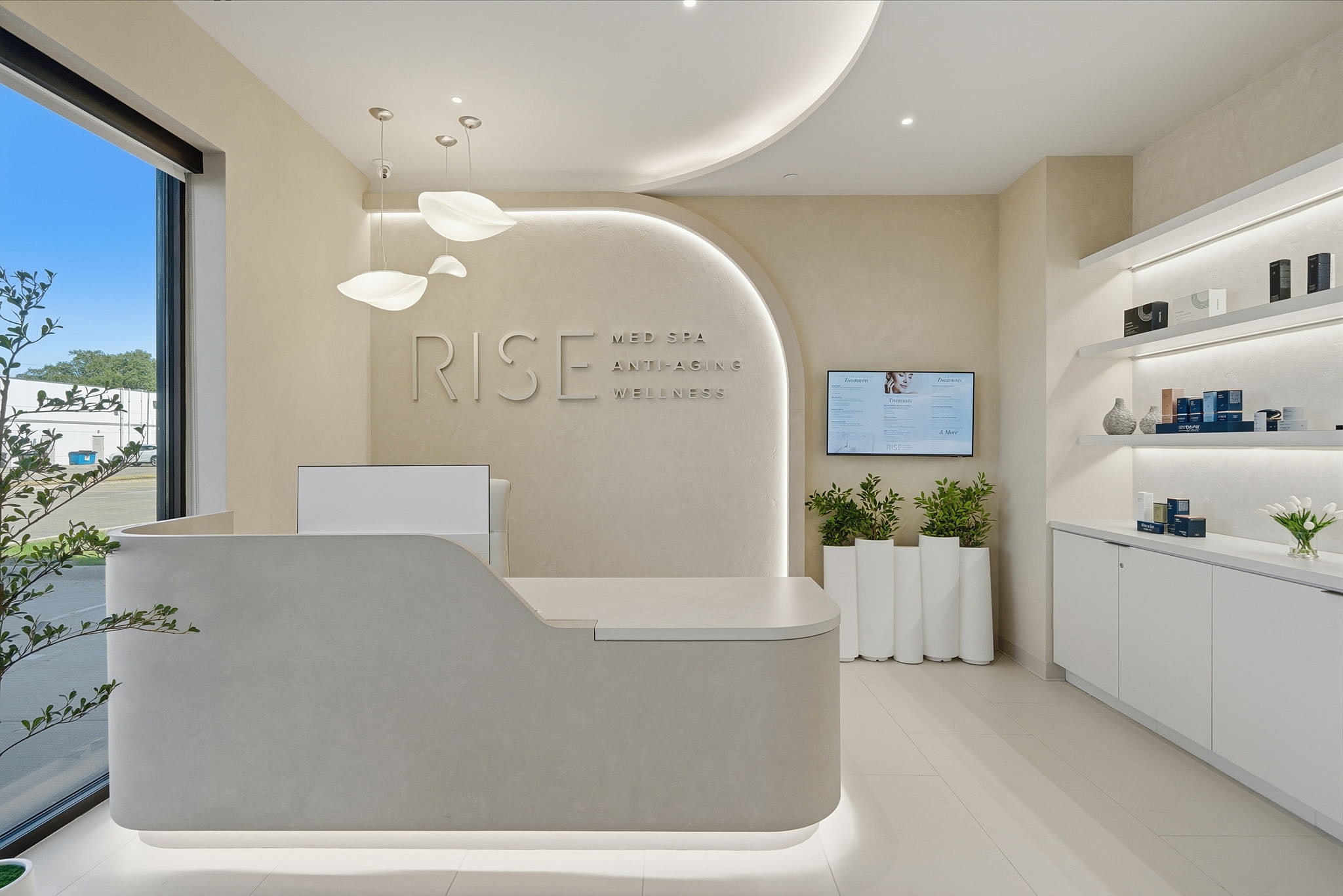 Modern med spa reception area with wellness products.