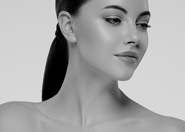 Black and white portrait of a woman.