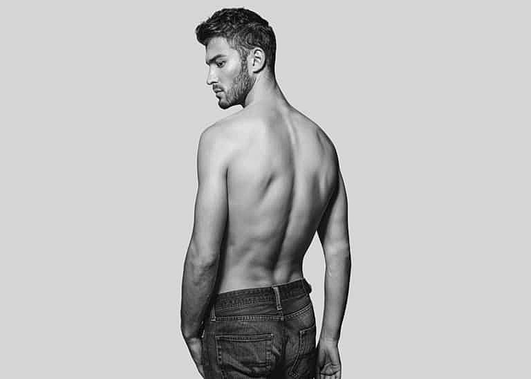 Male model posing in black and white.