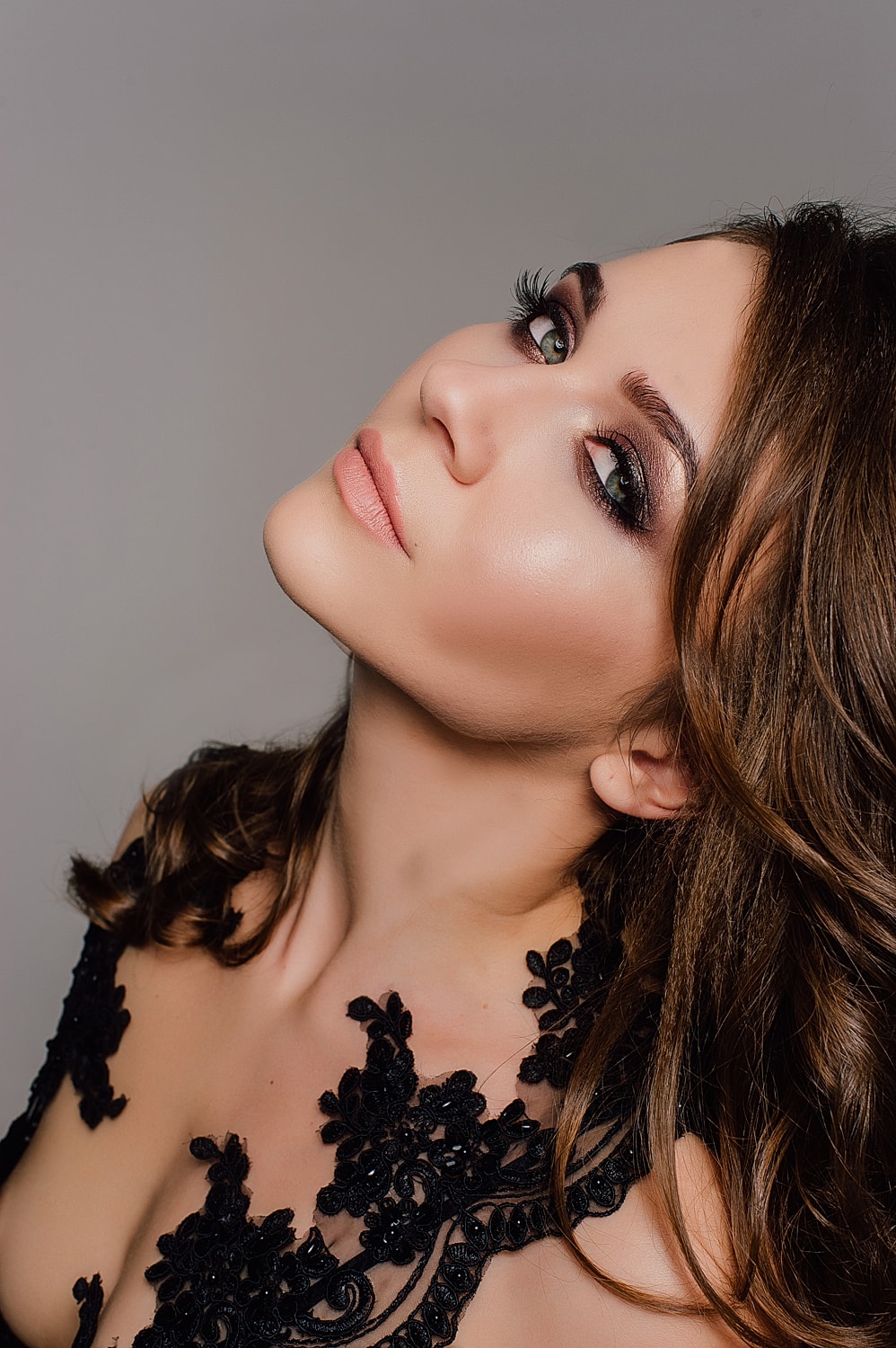 Black and white portrait of a thoughtful woman.