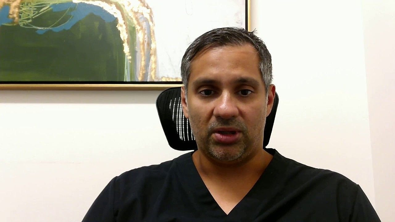 houston plastic surgeon - Dr. Ravi explaining a brachioplasty